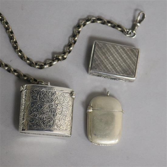 A George IV silver vinaigrette by Nathaniel Mills, Birmingham, 1827 and two later silver vesta cases.